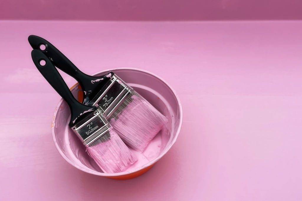 handyman services edinburgh pink paint brushes in pot